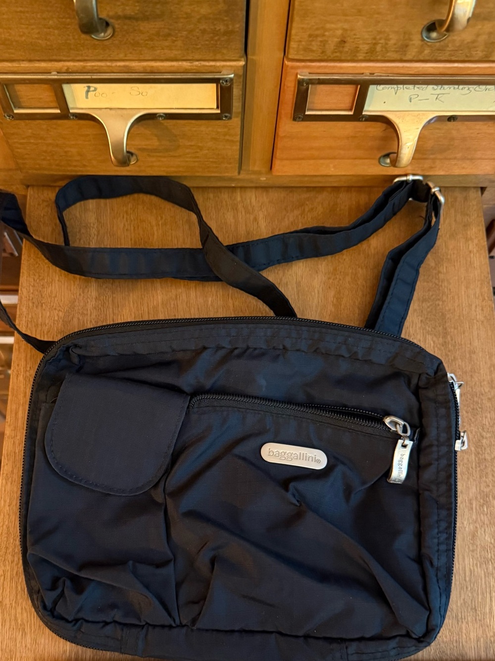 Baggallini Black Crossbody Bag with adjustable/convertible straps for Travelers
